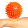 DrFit Miękka relaksująca piłka do masażu rehabilitacyjnego z wypustkami sensorycznymi ø 9 cm pomarańczowa